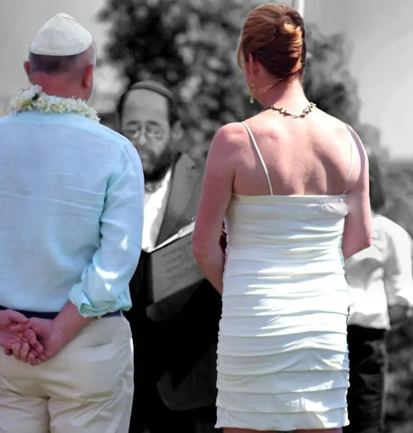 bride and groom at altar