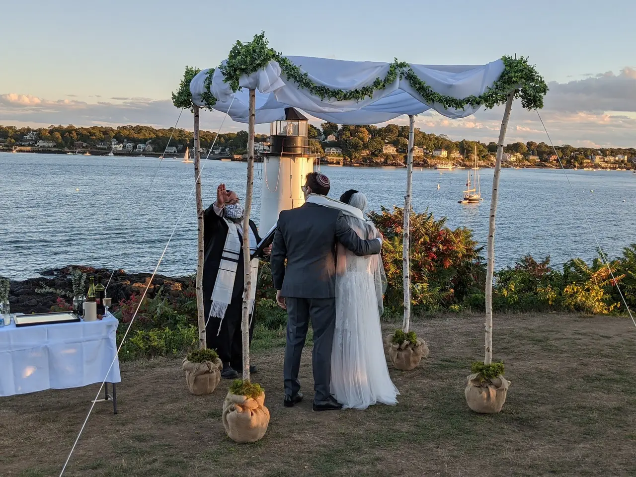 bride and groom under chuppah